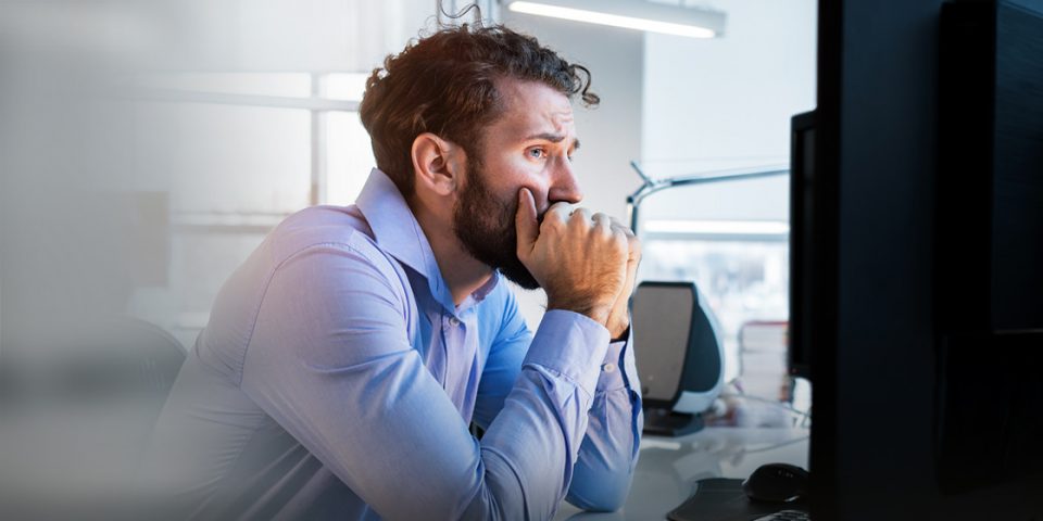 An image of a man expressing concern that his business doesn't have a way to classify emails based on intent detection. 